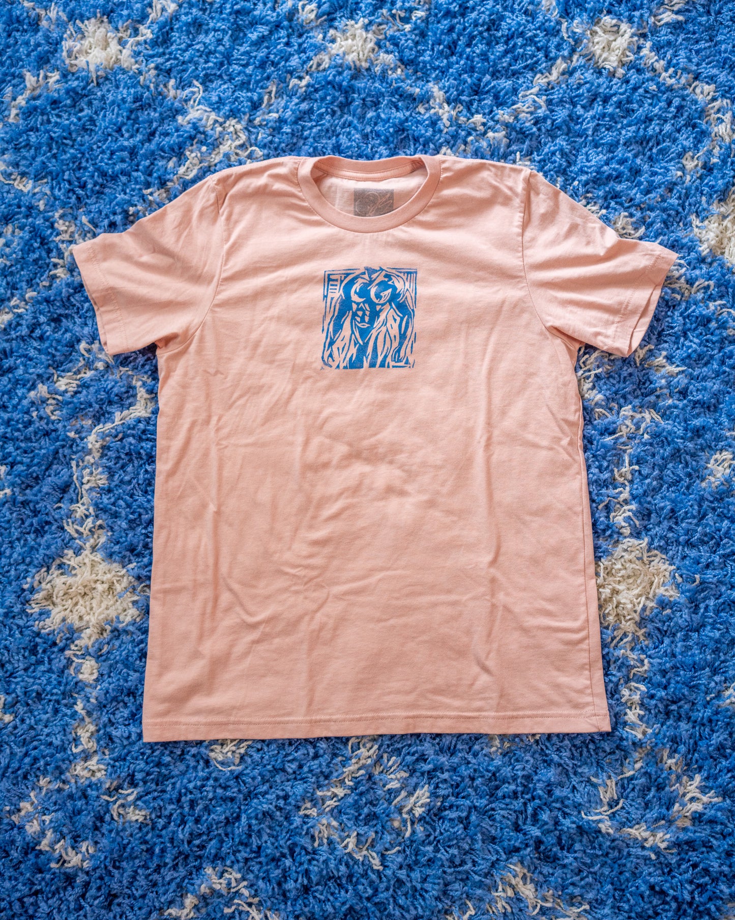 Man Stamp | Blue on Peach - Short Sleeve Tee