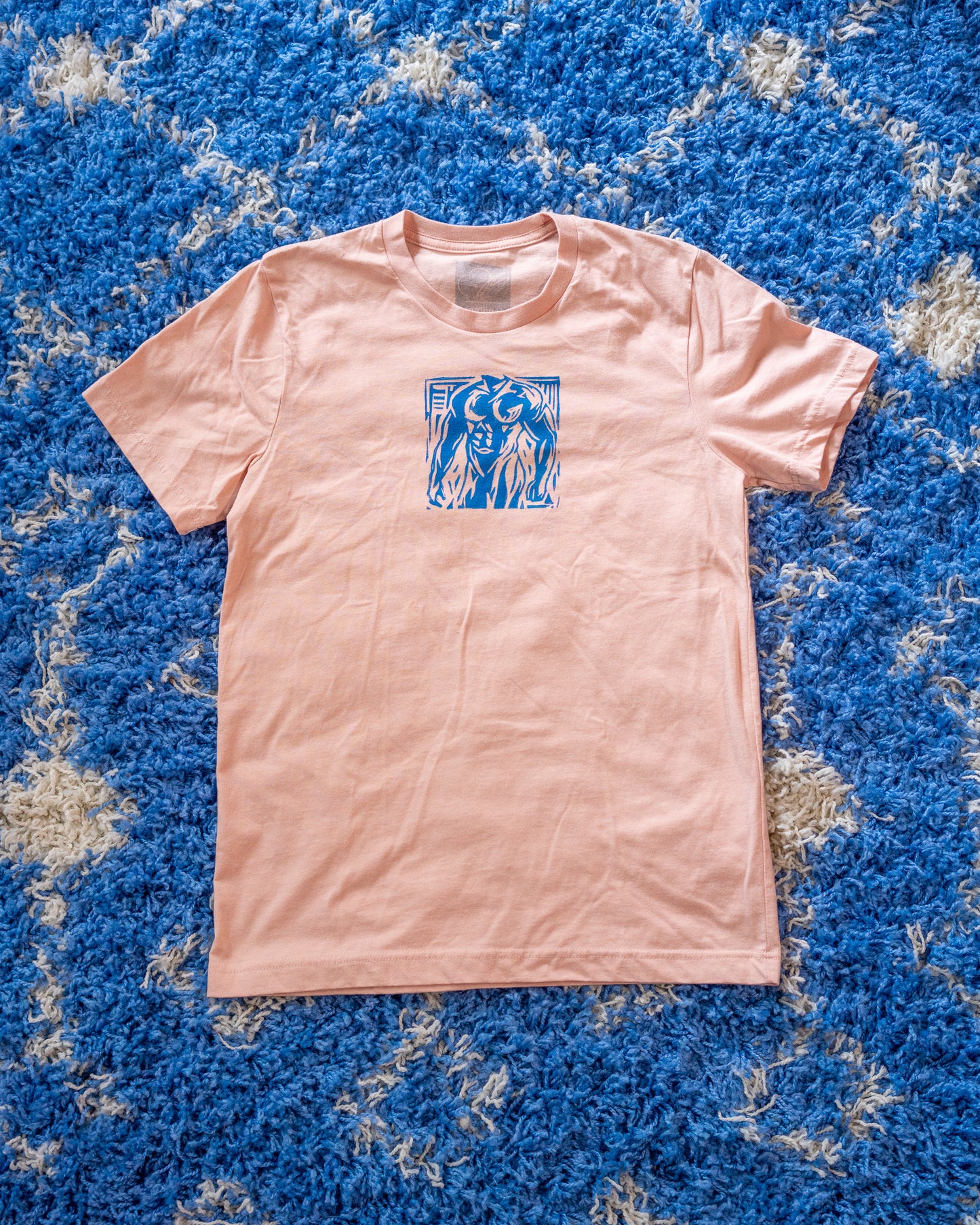 Man Stamp | Blue on Peach - Short Sleeve Tee